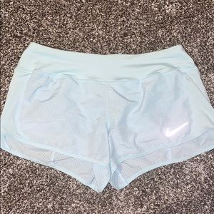 Small light blue Nike shorts